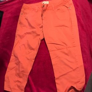 Lilith peach colored khaki pants, worn